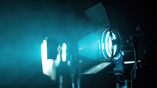 Professional lighting equipment on the movie set with smoke in the air