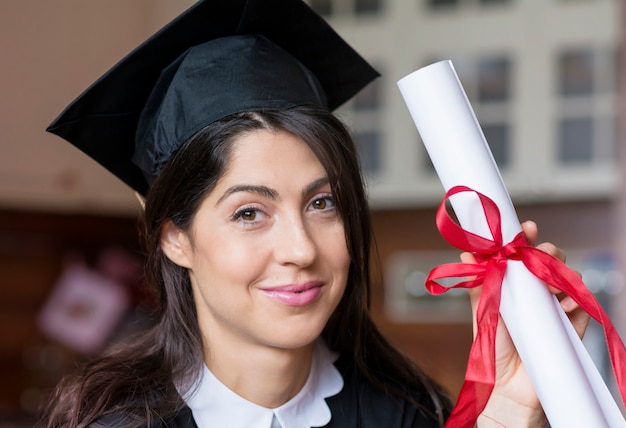 Proud girl with her diploma