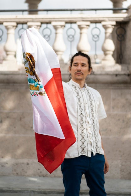 Proud man wearing mexican flag front view