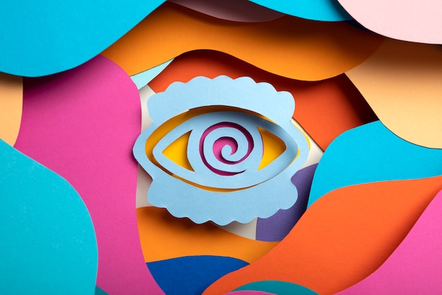 Free Photo psychedelic paper shapes with eye