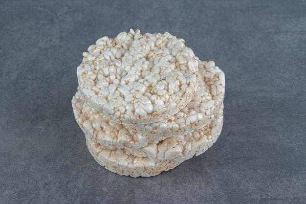 Puffed rice cakes on marble.