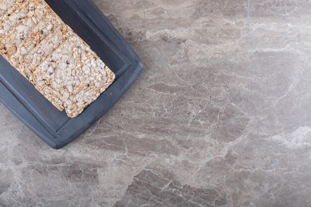 Puffed rice cakes in tray , on the marble background.