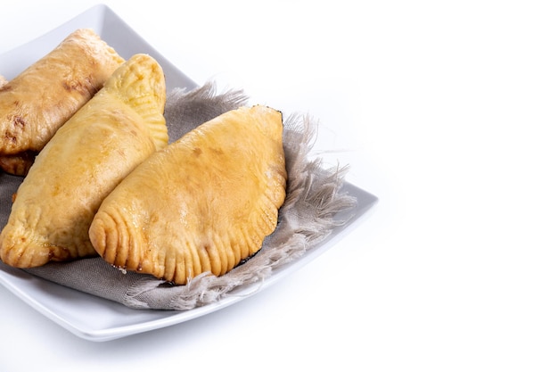 Pumpkin empanadillas for Halloween or Thanksgivings Day isolated on white background