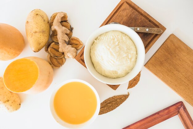 Pumpkin soup and potato puree in bowls 