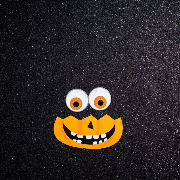 Free photo pumpkin with eyes for halloween night