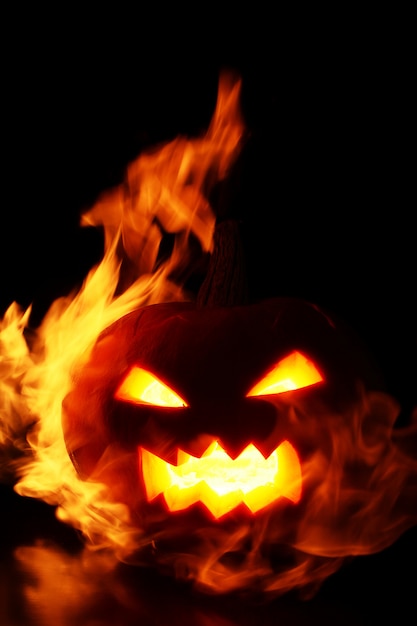 Free photo pumpkin within flames