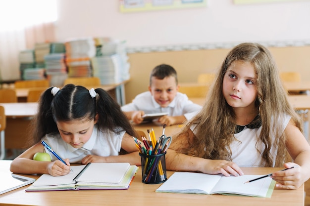 Pupils sitting in class