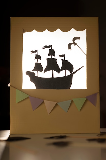 Free photo puppet show in cardboard arrangement