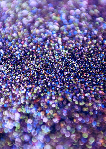 Free photo purple glitter bokeh lights background