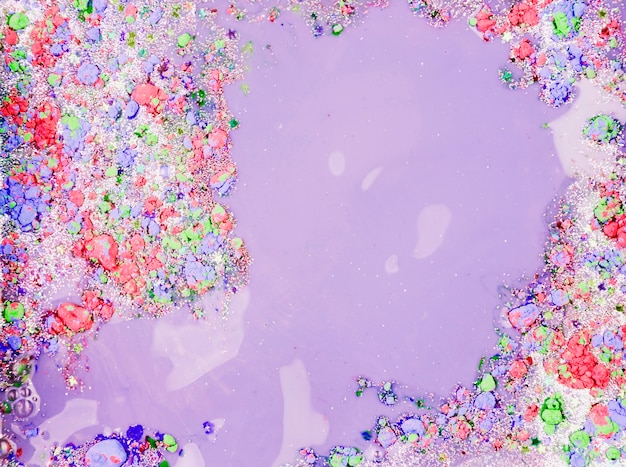 Free Photo purple liquid with colourful crumbs