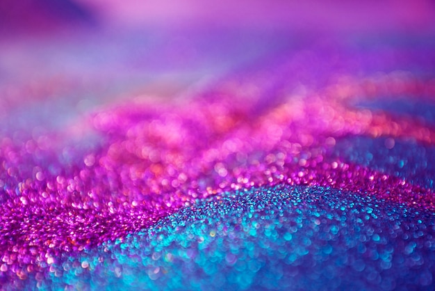 Free photo purple and pink glitter bokeh lights background