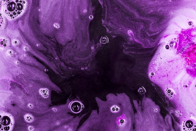 Free photo purple water with bath bomb