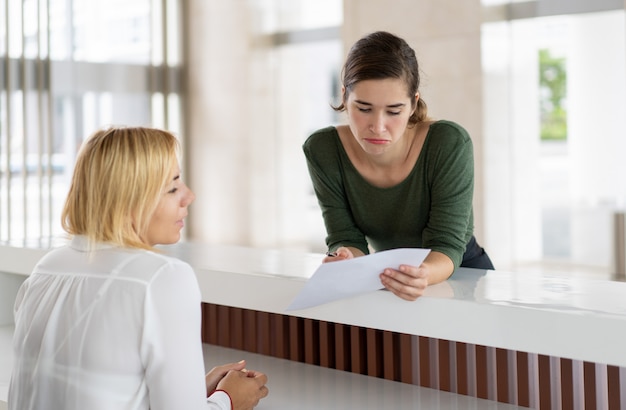 Puzzled female guest having trouble