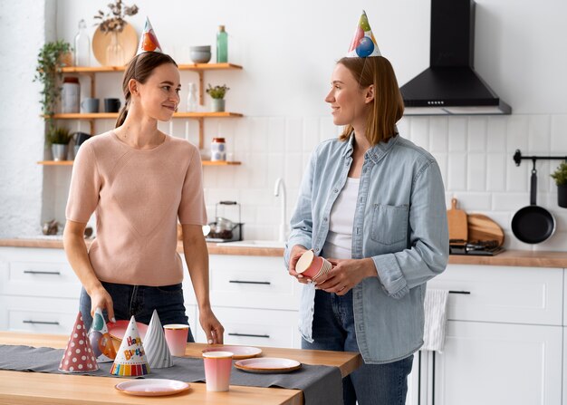 Queer couple celebrating birthday together