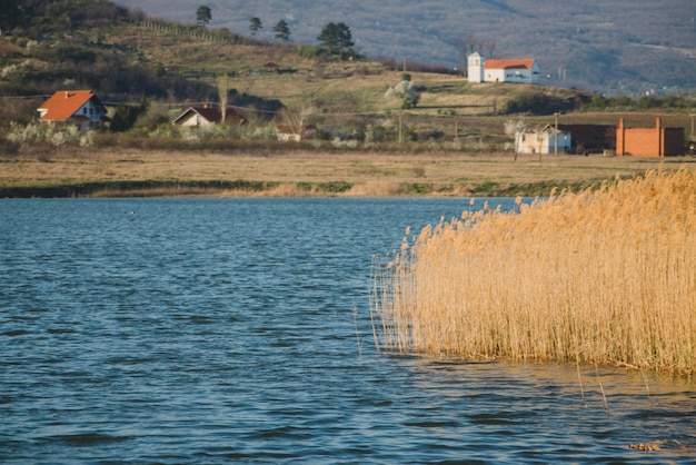 Free photo quiet village by the lake