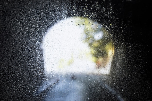 Free photo rain effect on tunnel background