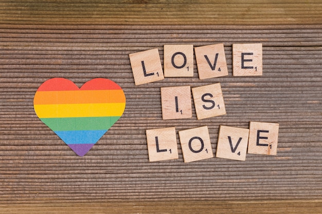 Free Photo rainbow heart and lgbt motto love is love