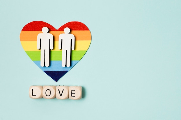 Free photo rainbow heart with couple