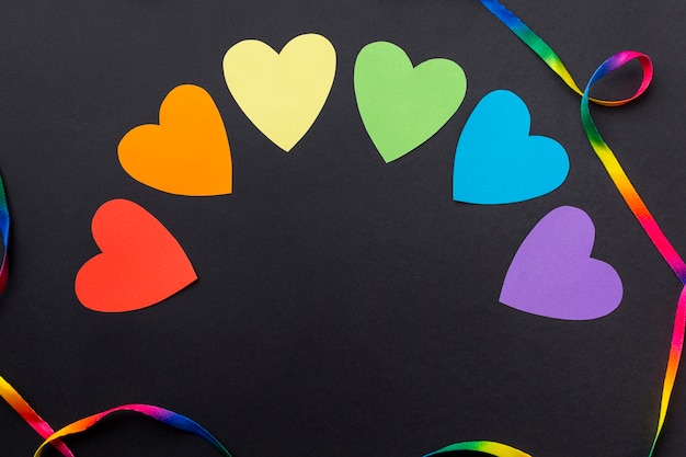 Free Photo rainbow hearts flag flat lay