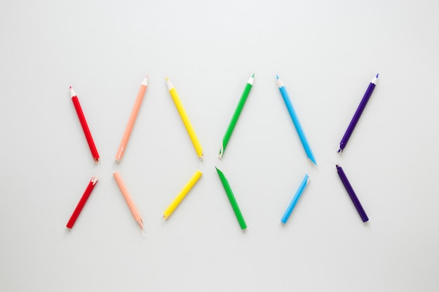 Rainbow made of six colorful pencils 