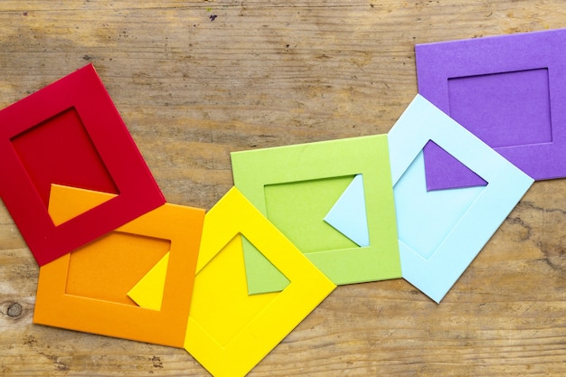 Free photo rainbow origami on desk