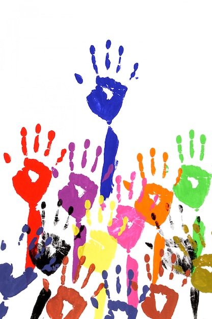 Free photo raised hands in acrylic paint