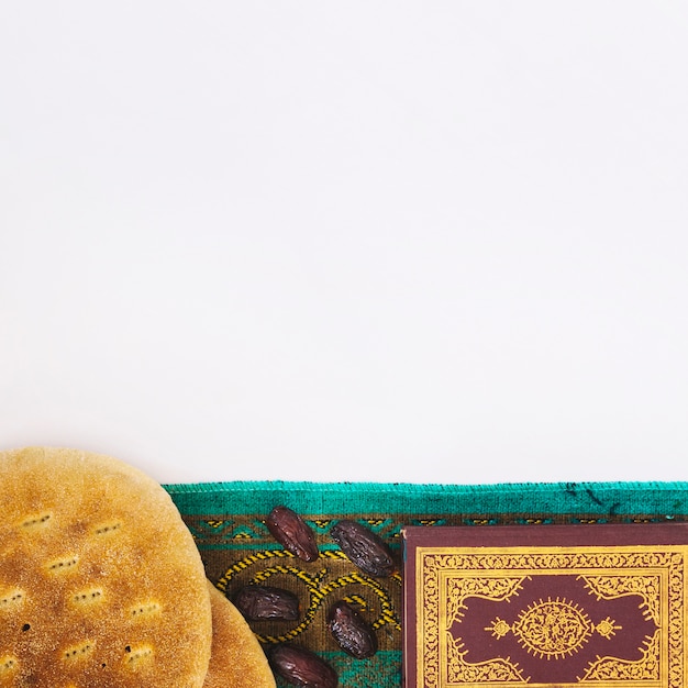 Free photo ramadan concept with arab bread and dates and copyspace above