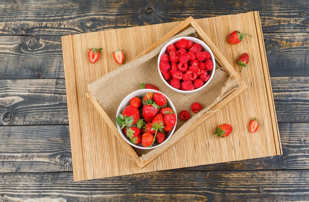 Raspberries in plate with strawberries and figs