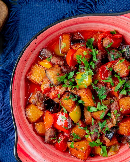 Ratatouille bell pepper meat eggplant tomato potato top view