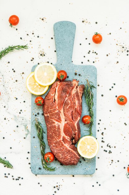 Raw beef meat on cutting board