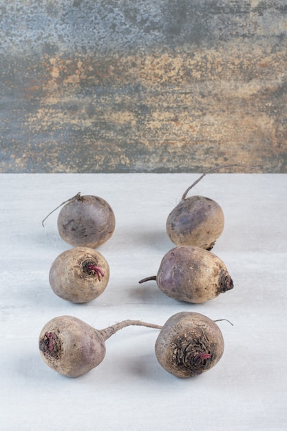 Raw fresh beetroots on stone table. High quality photo