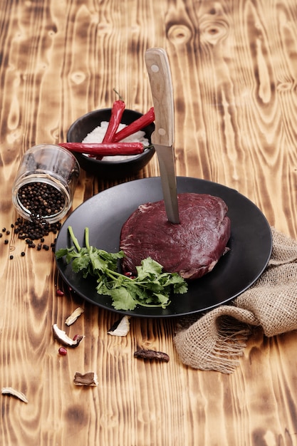 Free Photo raw meat with ingredients for cooking meal