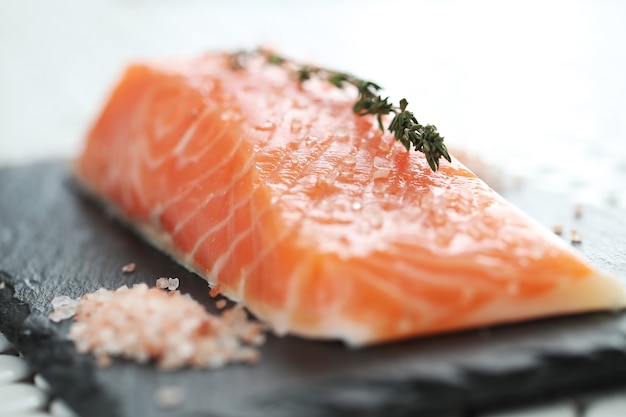 Raw salmon with pink salt and rosemary