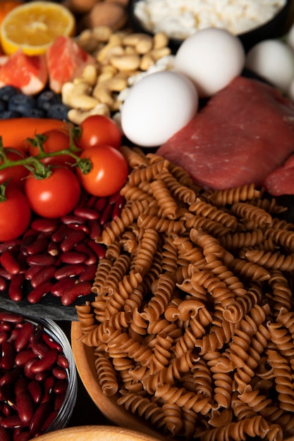 Free photo real food pyramid arrangement still life