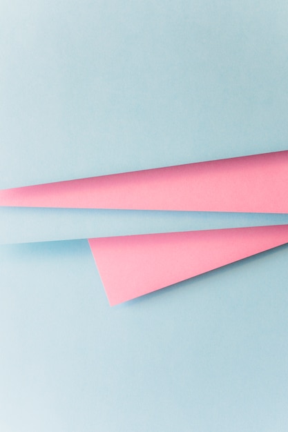 Realistic blue and pink paper background