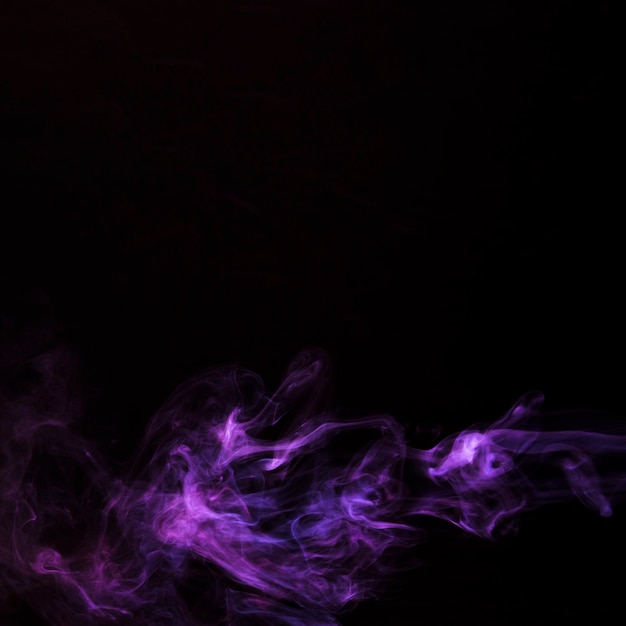 Realistic purple smoke waves isolated on black background