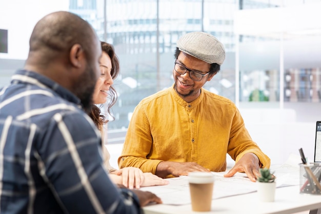 Realtor meeting with entrepreneurs to establish leasing contract terms