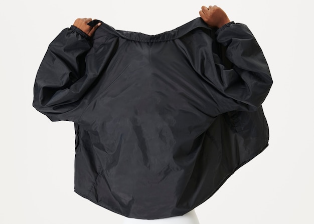 Free Photo rear view of a black woman wearing a black jacket 