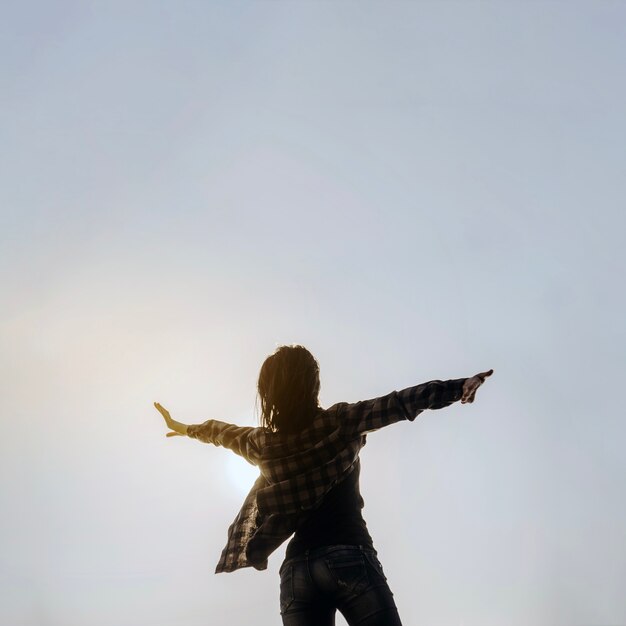 Rear view of woman looking at the sky