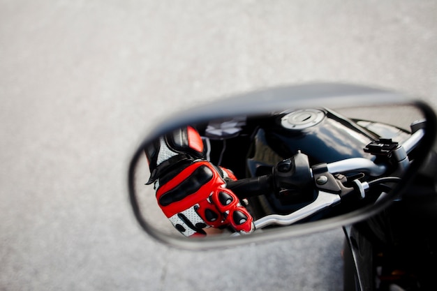 Rearview mirror view of the biker