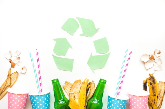 Recycle logo with garbage 