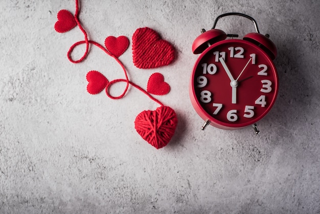 Red alarm clock with Red heart, Valentines day concept.