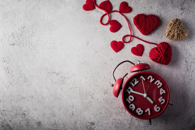 Red alarm clock with Red heart, Valentines day concept.