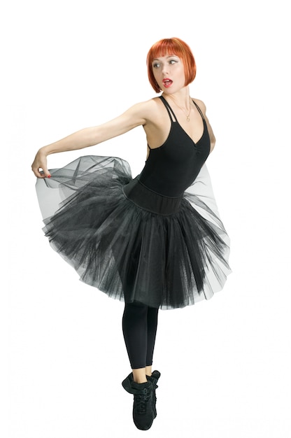 Red ballerina wearing black tutu