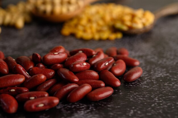 Red bean on a black cement floor