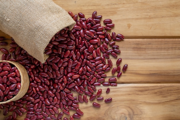 Free photo red bean paste on brown wood floor.