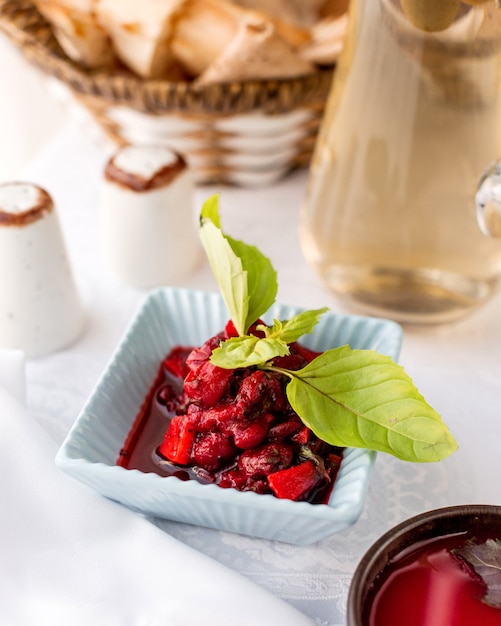 Free photo red bean salad with carrots in a white bowl