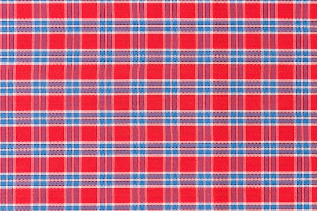 Free photo red and blue checkered pattern texture background