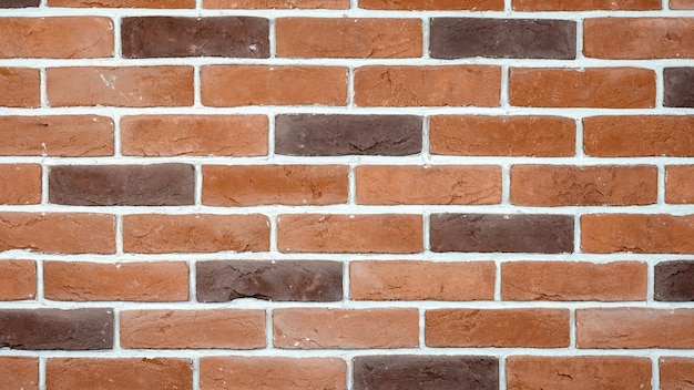 Free photo red and brown bricks wall background