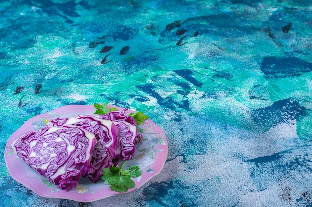 Free Photo red cabbage and parsley on a plate 